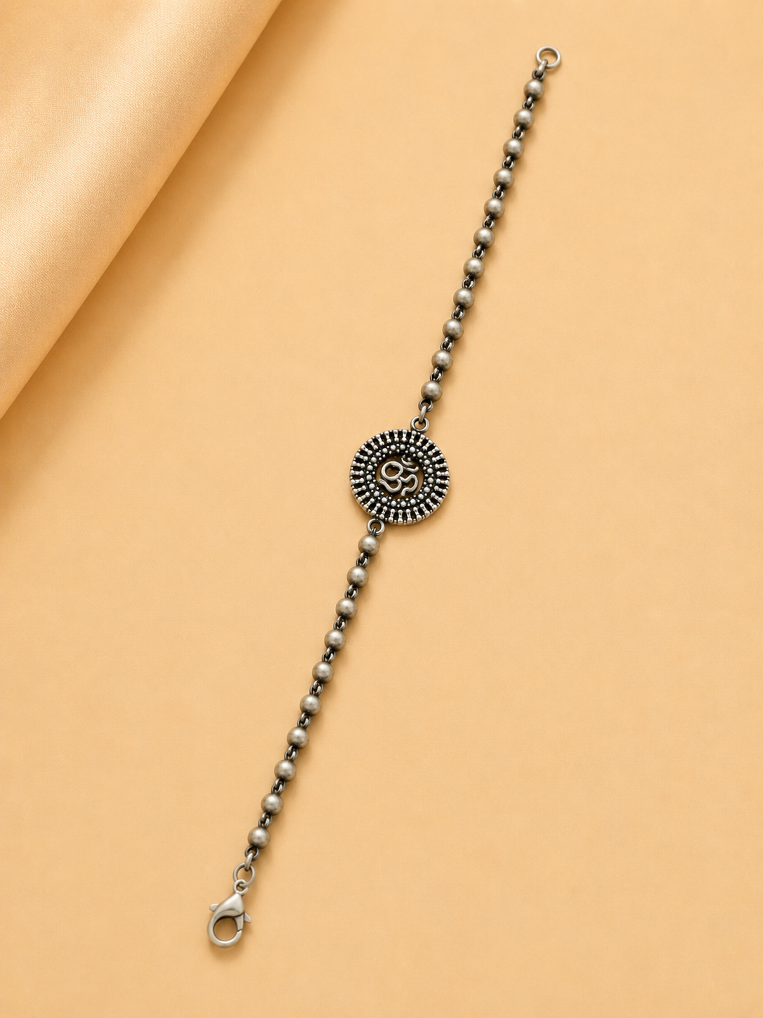 Divine Om Rakhi Bracelet