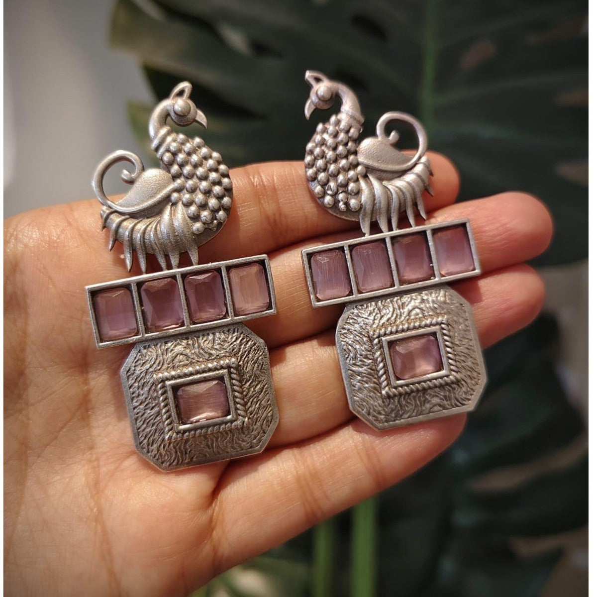 Tribal Tales Peacock motif with multi-stone cluster studs