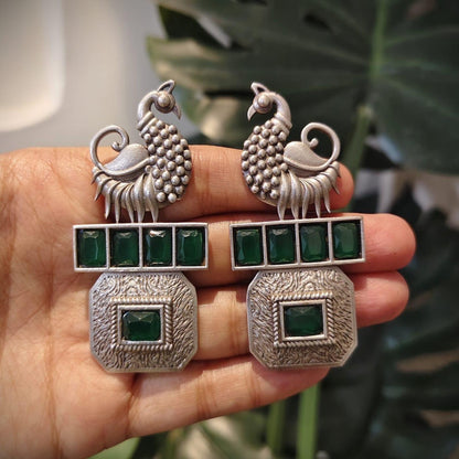 Tribal Tales Peacock motif with multi-stone cluster studs