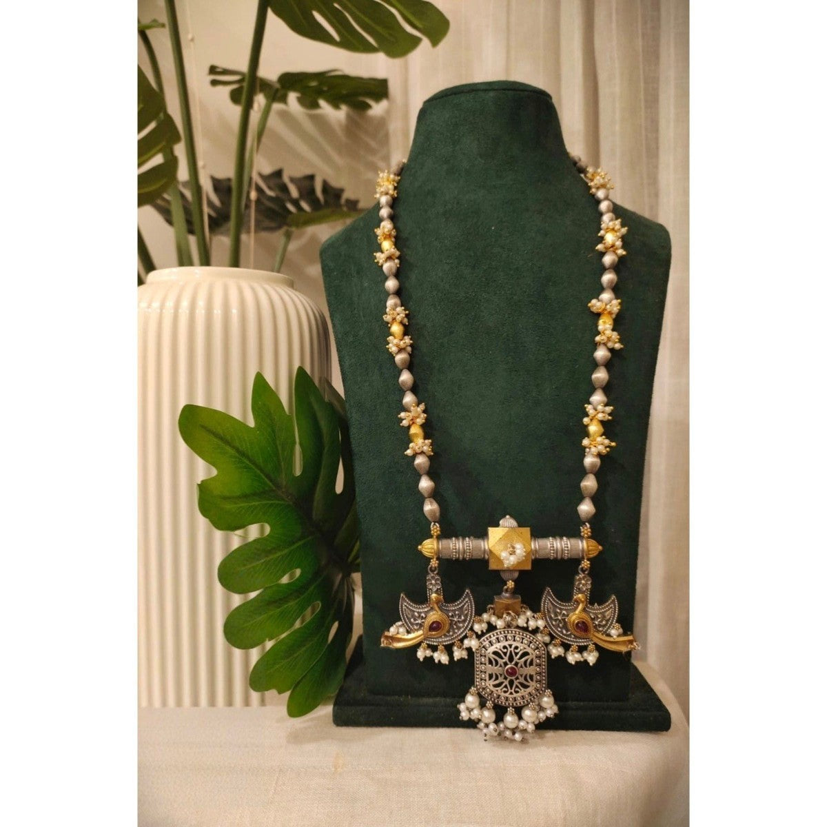 Tribal Tales Dual Tone Pearl Necklace with Fusion Bird Pendant